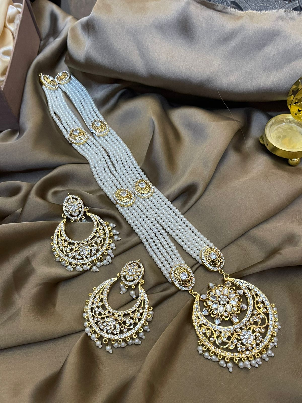Premium Quality Golden Based stoned Studded Hyderabadi Mala Set