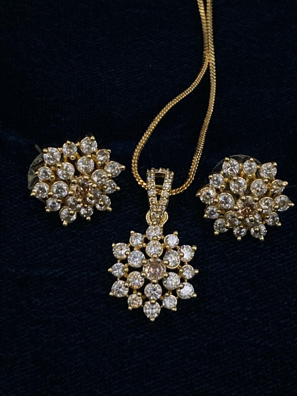 Premium Quality Gold Plated Zircons Studded Pendant Set Along With Mala